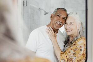 Couple in a mirror after making a mirror will